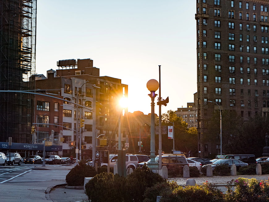 Sunset over Brooklyn Cityscape with Traffic and Buildings