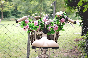 Vintage Bicycle with Pink Roses in Wicker Basket