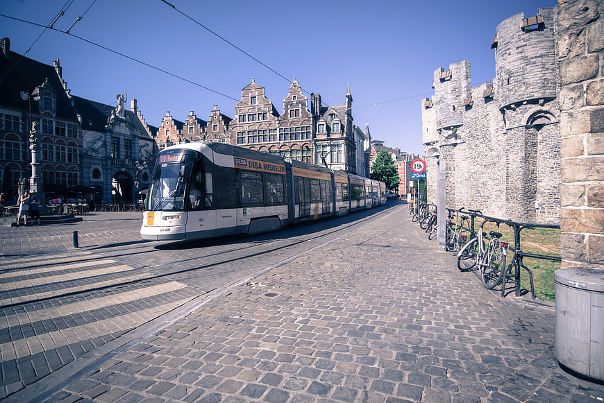 Modern Tram on Cobblestone Street in Historic Ghent Belgium