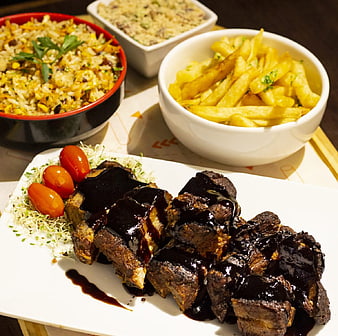 Saucy BBQ Ribs with Fries and Rice Meal