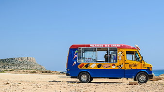 Colorful Ice Cream Truck on Sandy Beach