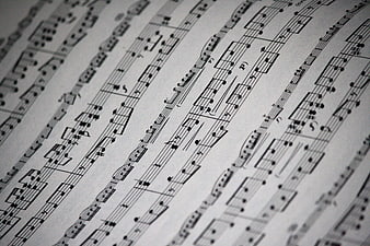 Close-up of black and white musical sheet music notes