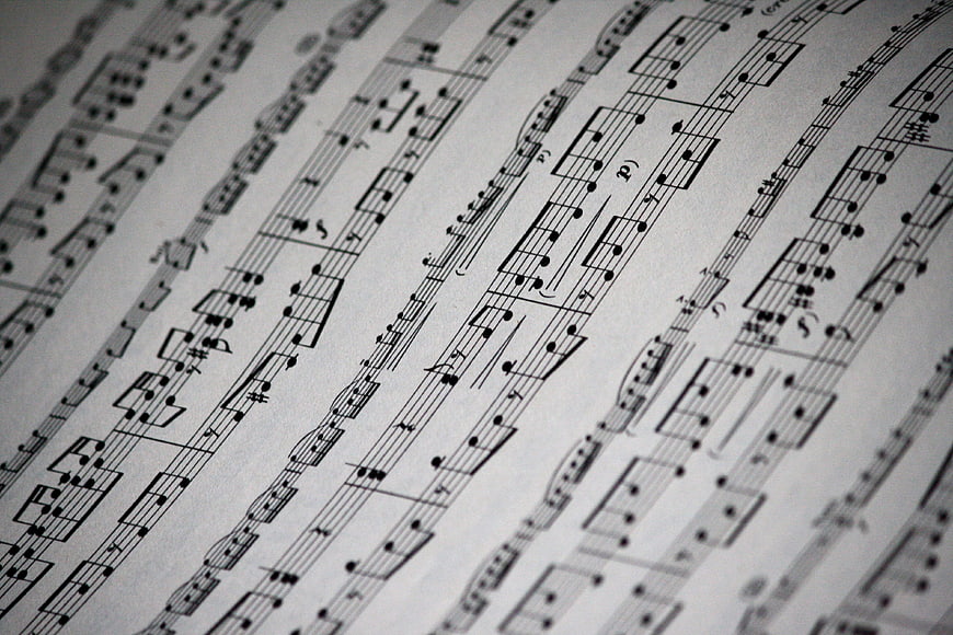 Close-up of black and white musical sheet music notes