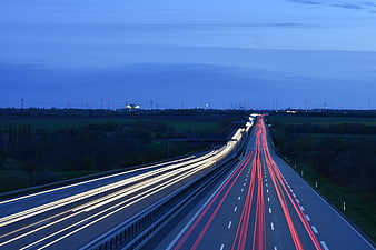 Long exposure highway traffic light trails at dusk