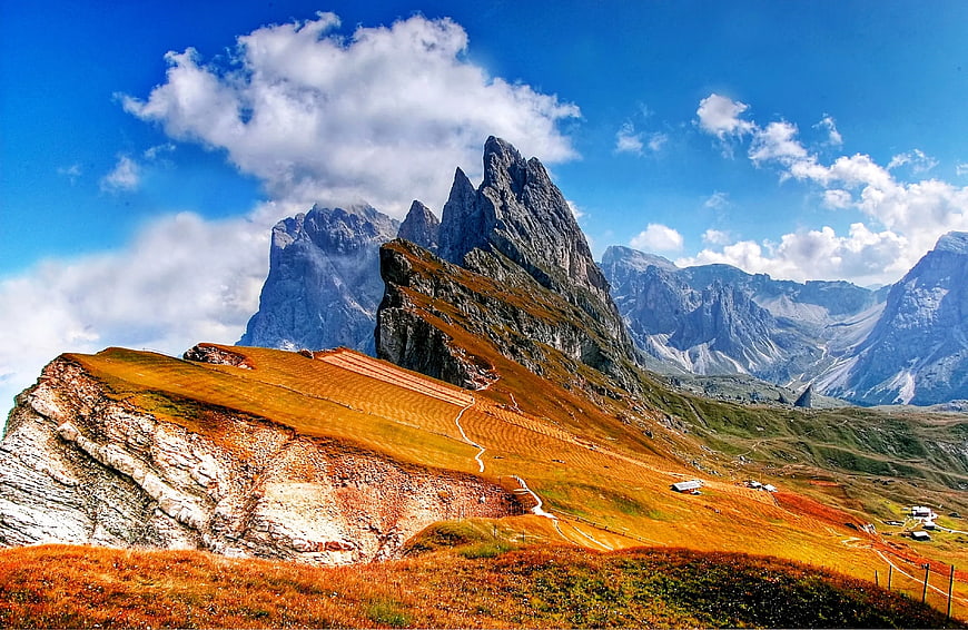Dramatic Dolomites Mountain Landscape with Golden Autumn Slopes
