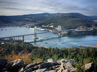 Aerial View of Large Suspension Bridge Over River Estuary