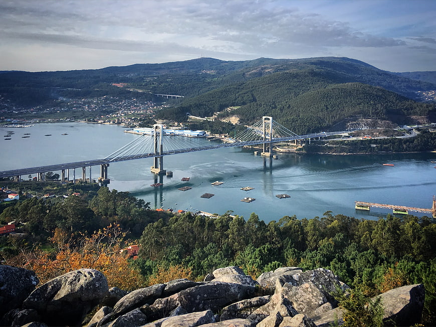 Aerial View of Large Suspension Bridge Over River Estuary
