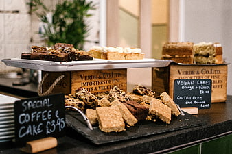 Rustic Bakery Display with Brownies, Cakes, and Chalkboard Signs