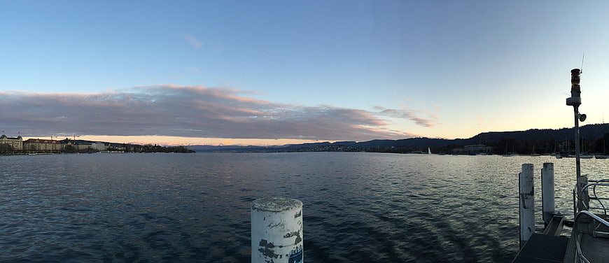 Panoramic Lake Zurich Sunset with Dock and City Skyline