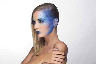 Creative Blue Fantasy Makeup Portrait Of Young Woman