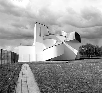 Modern White Architectural Building with Curved Lines