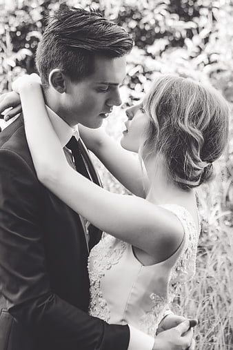 Romantic Black and White Portrait of Bride and Groom Embracing