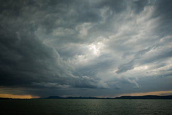 Dramatic Storm Clouds Over Lake Balaton at Sunset