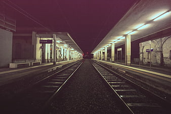 Empty Train Station Platform at Night with Leading Lines