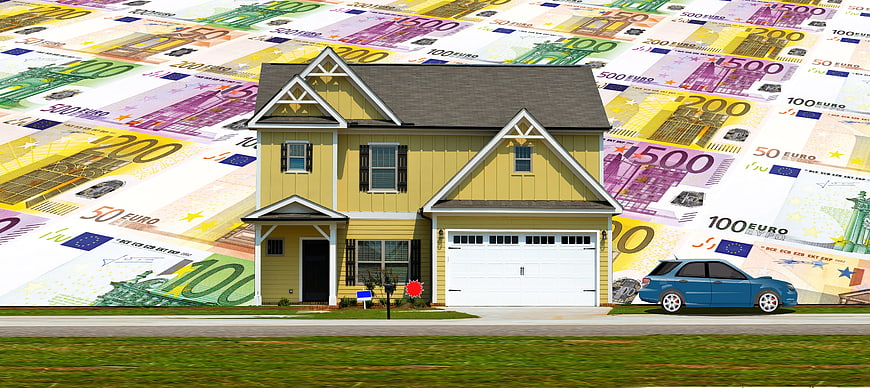 Yellow suburban house with car on background of euro banknotes
