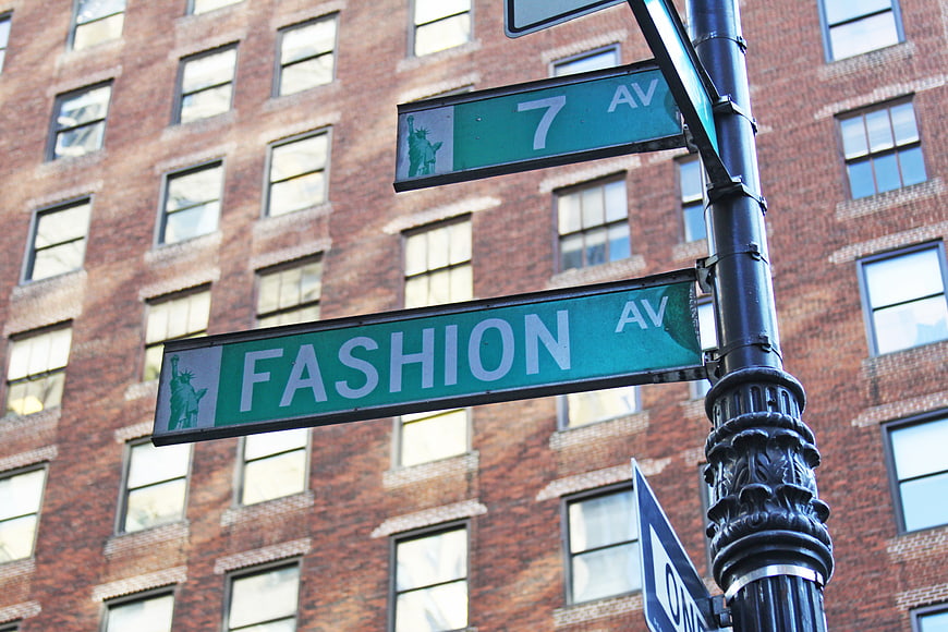 Fashion Avenue and 7th Avenue street signs in New York City