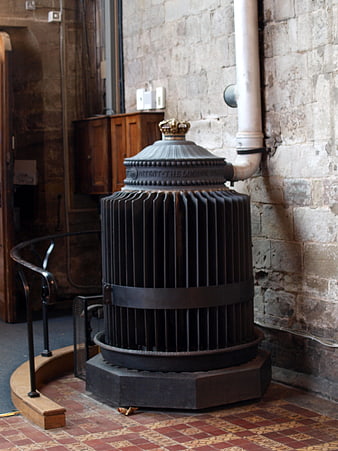 Vintage Victorian Cast Iron Radiator in Historic Stone Interior