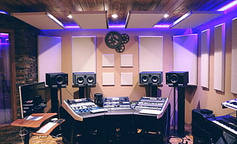 Professional Recording Studio with Mixing Console and Speakers