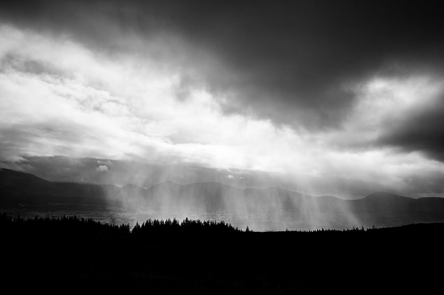 Dramatic Black and White Mountain Landscape with Sunbeams