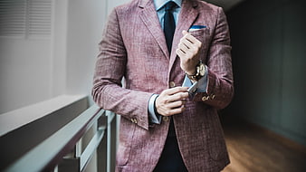 Businessman in Textured Blazer Checking Watch and Smartphone