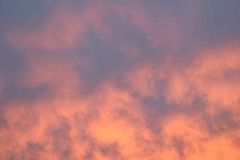 Vibrant Pink and Orange Sunset Clouds Sky Background