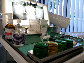 Dental Treatment Room Setup With X-Ray And Medical Instruments