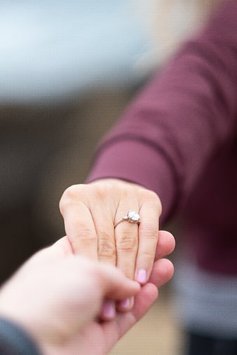 Close-up of Engagement Ring on Woman's Hand