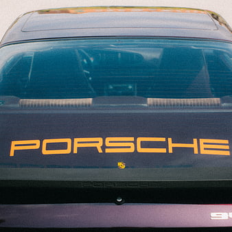 Vintage Porsche Rear Detail with Orange Lettering