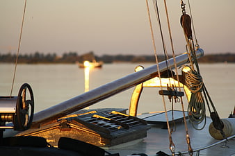 Sailboat deck details at sunset with golden light