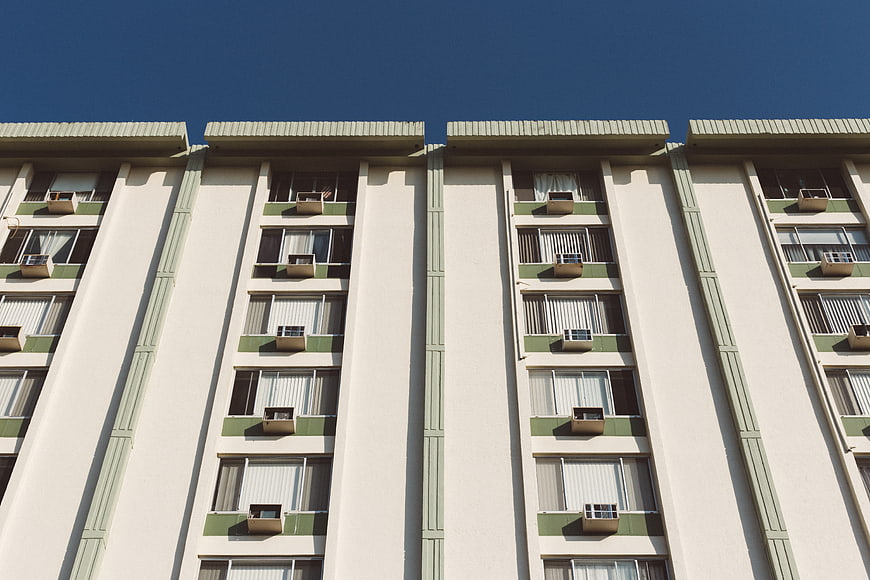 Low angle view of retro apartment building facade