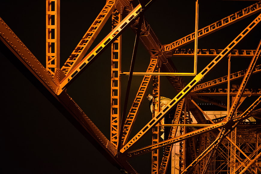 Abstract Steel Lattice Structure of Tower at Night
