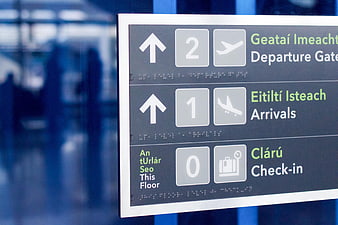 Bilingual Airport Directional Sign with Icons