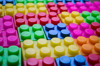 Close-up of colorful plastic building blocks with studs