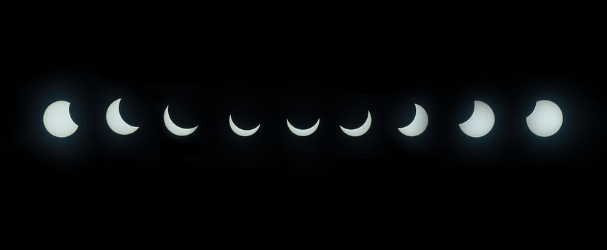 Solar Eclipse Sequence Stages on Black Background