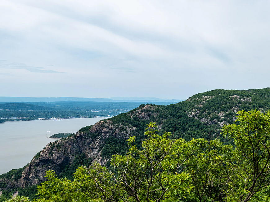 Scenic View of Green Mountains and River Valley