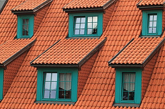 Orange Roof Tiles with Teal Dormer Windows
