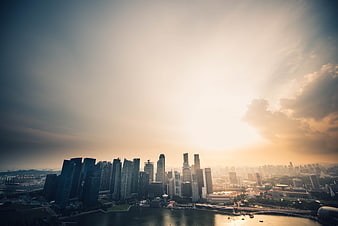 Singapore Skyline at Sunset with Dramatic Sun Rays