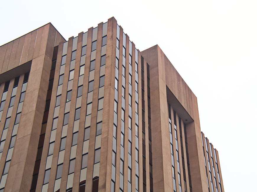 Low angle view of modern brown office building facade