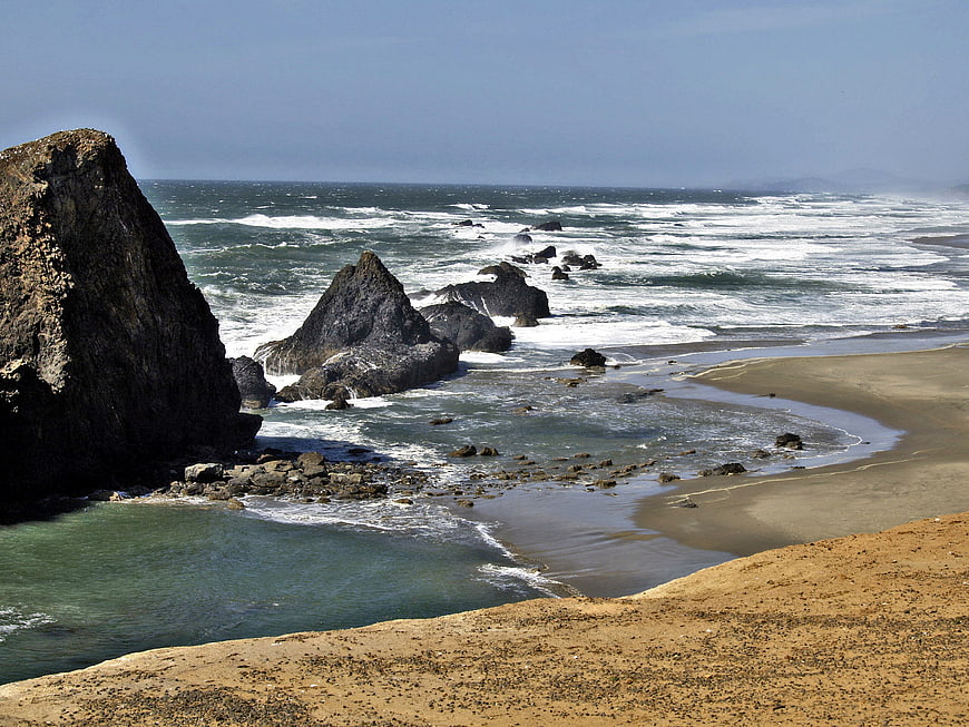 Dramatic Oregon Coastline with Rocky Outcrops and Sandy Beach