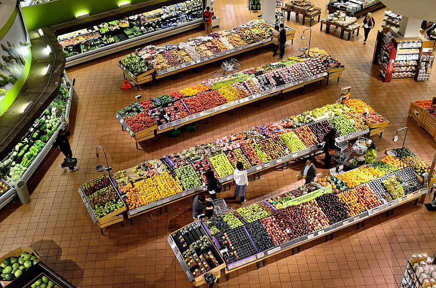High angle view of colorful fresh fruit and vegetable section in supermarket