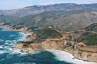 Bixby Creek Bridge on California Coastline with Mountains