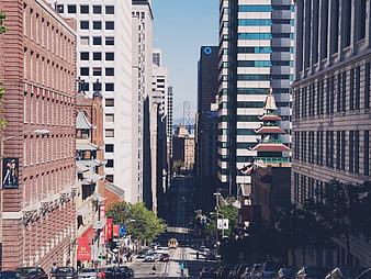 San Francisco Chinatown street view with pagoda and Bay Bridge