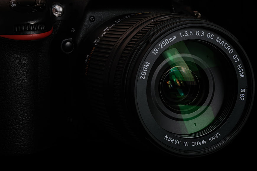 Close-up of Professional DSLR Camera Lens on Black Background