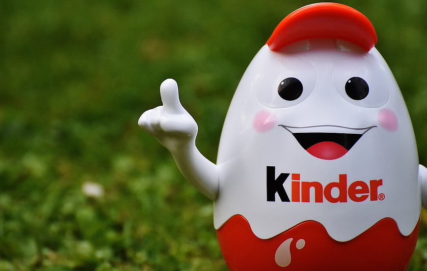 Kinder Egg Mascot Toy with Green Background
