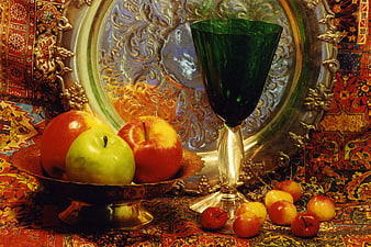 Vintage still life with apples, cherries, and green glass goblet