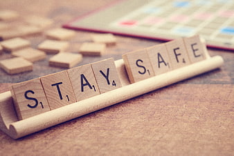 Stay Safe Scrabble Tiles on Wooden Rack
