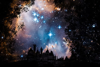 Fantasy castle silhouette against vibrant starry nebula sky