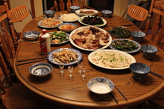 Traditional Chinese Family Dinner Table With Various Dishes