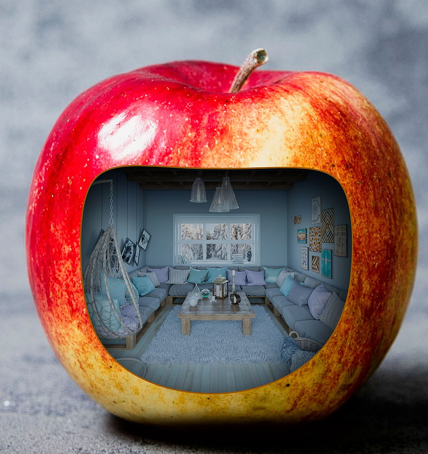 Surreal red apple with cozy blue living room interior cutout