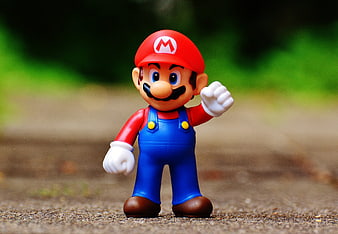 Super Mario Bros Figure Toy on Outdoor Path